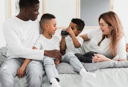 multicultural-family-playing-with-camera-indoors_23-2148466974 multicultural-family-playing-with-camera-indoors_23-2148466974